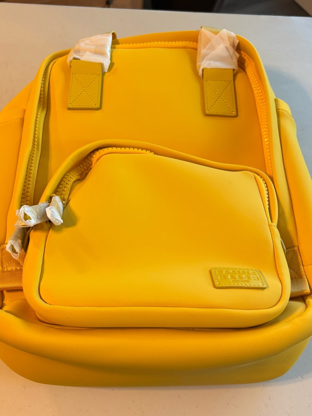 Cama small neoprene elite spicy mustard backpack by pacific mason